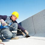 Flat roof covering works with roofing felt Cheddar